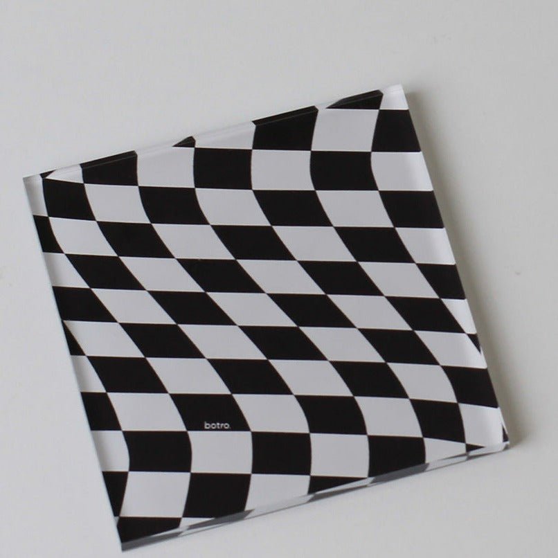 Dambordonderzetter Van Duurzaam Acryl Voor Je Eettafel Zwart onregelmatig