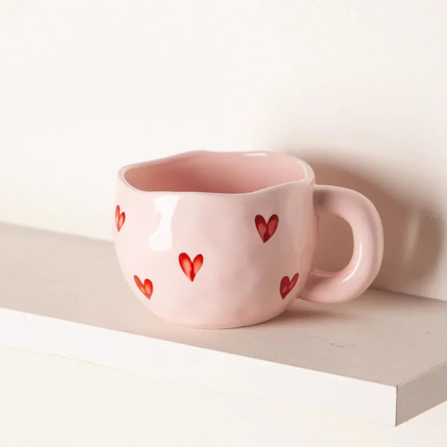 Keramische koffiekop met roze hart