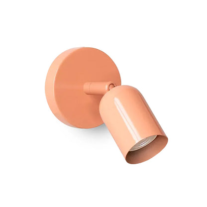 Ares Bauhaus led-wandlamp bij het bed Roze