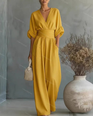 Lumina | Elegante en getailleerde jumpsuit met diepe V-hals – Luxe Designer eendelig Pak Geel