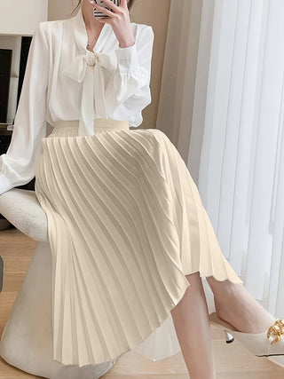 Mechi | Geplooide satijnen damesrok – hoge taille en gladde afwerking