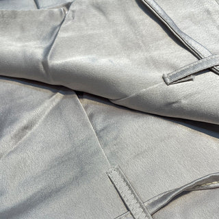 Luxe tweedelige set met elegante top en broek, geschikt voor feestjes en dagelijks gebruik.